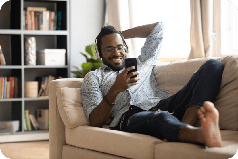 Man relaxing on couch while using the Flarebreak app
